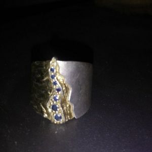 Sterling silver ring accented with gold
